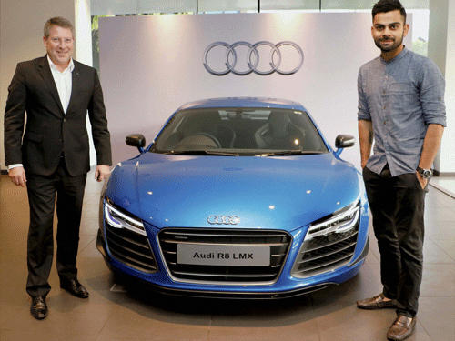 Joe King, Head Audi India delivers the limited edition Audi R8 LMX to ace cricketer Virat Kohli in Mumbai on Friday. PTI Photo