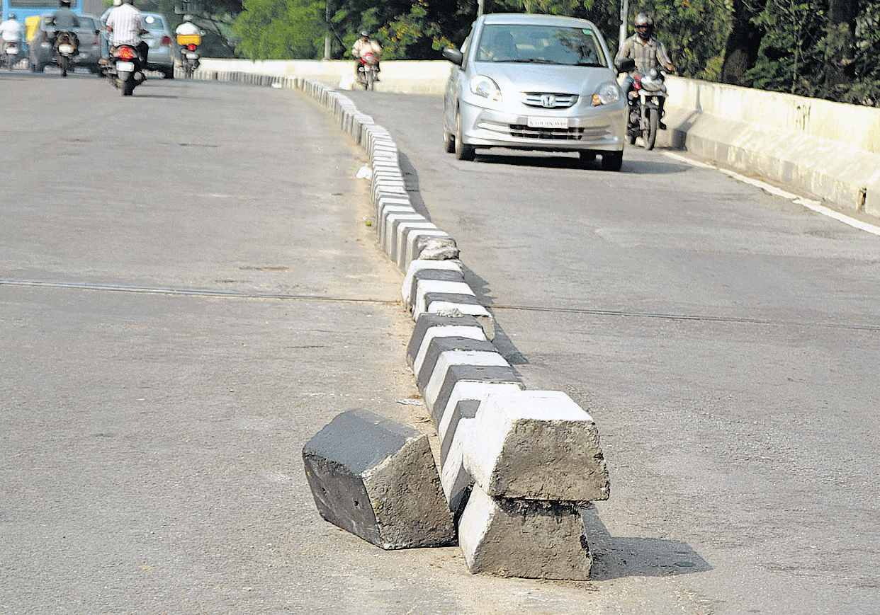 Undivided: The uneven and unscientific road dividers in the City are posing a grave threat to the motorists. DH&#8200;PHOTO