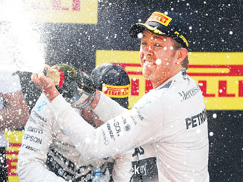 champagne showers: Mercedes' Nico Rosberg celebrates his win in Barcelona on Sunday. reuters