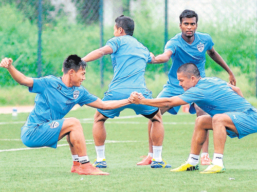 Gearing up: BFC captain Sunil Chhetri (right) with his team-mates during a practice session ahead of his side's AFC Cup clash against Persipura Jayapura . DH PHOTO/Srikanta SHARMA R