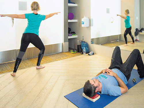 Passengers relax in a yoga roomat San Francisco International Airport after a flight fromVietnamin San Francisco. San Francisco is one of a growing number of airports that are creating rooms for yoga andmeditation. NYT