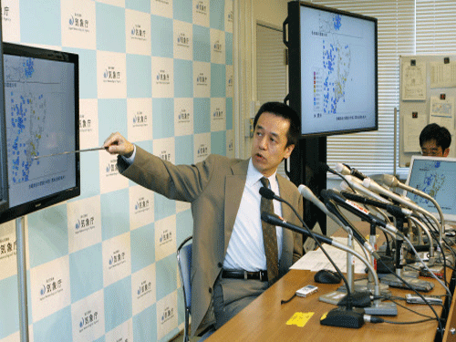 Meteorological agency official Yohei Hasegawa speaks during a news conference after a magnitude 6.8 earthquake struck northeastern Japan. AP photo