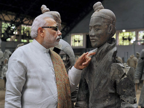 Prime Minister Narendra Modi during his visit to Terracotta Warriors Museum, in Xi'an, China. PTI photo
