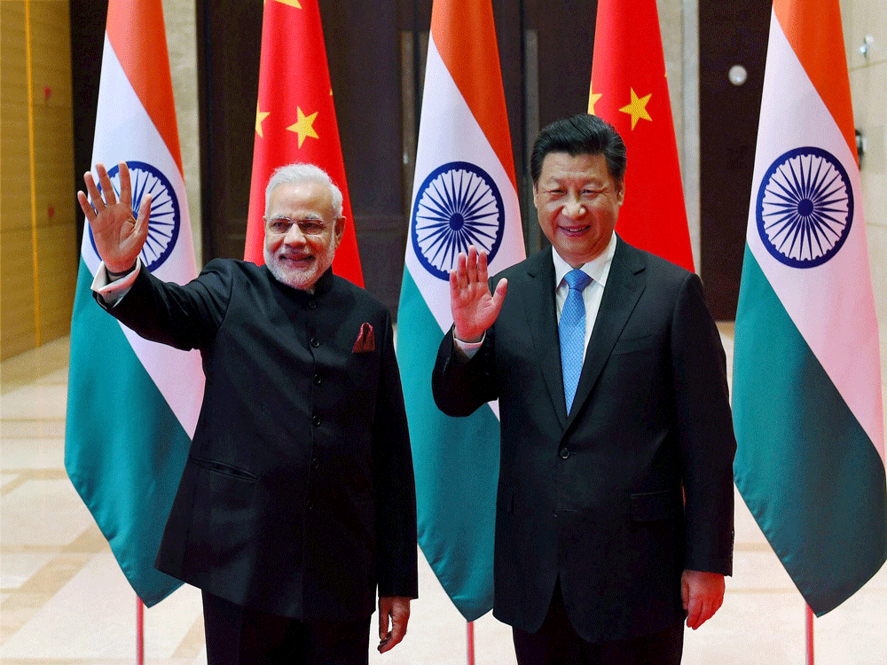 Prime Minister Narendra Modi and President Xi Jinping. PTI File Photo.