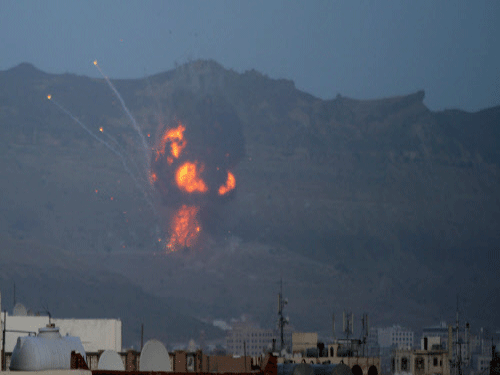 An explosion is seen from the Noqum Mountain after it was hit by an air strike in Yemen's capital Sanaa. Reuters photo