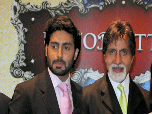 Amitabh Bachchan with son Abhishek Bachchan. pti file photo