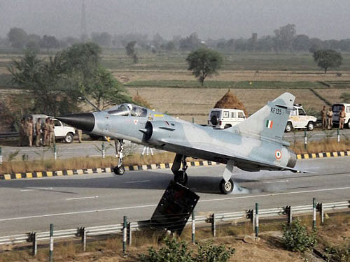 Mirage 2000 fighter aircraft of the Indian Air Force successfully lands on the Yamuna Expressway near Mathura as part of trials to use national highways for emergency landing, on Thursday. PTI Photo