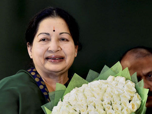 AIADMK supremo J Jayalalithaa is greeted after she took oath as Tamil Nadu Chief Minister at Madras University Centenary Auditorium in Chennai. PTI Photo