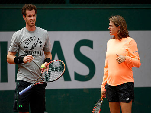 Amelie Mauresmo with Andy Murray, who hasn't lost a match on clay this year. Reuters Photo.