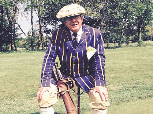 from another world President of the British Golf Collectors Society and hickory golf enthusiast Philip Truett, wearing period dress, with his playing clubs at the Royal Automobile Club's Vintage Golf Day in Epsom, Britain. reuters