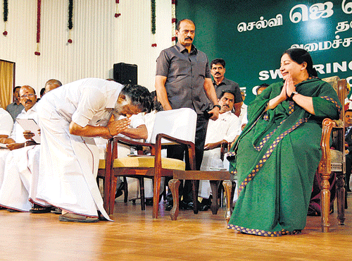 Former chief ministerOPanneerselvambowsin front of AIADMKleader Jayalalitha after she took oath as the newchief minister of Tamil Nadu in Chennai, on Saturday. AP photo