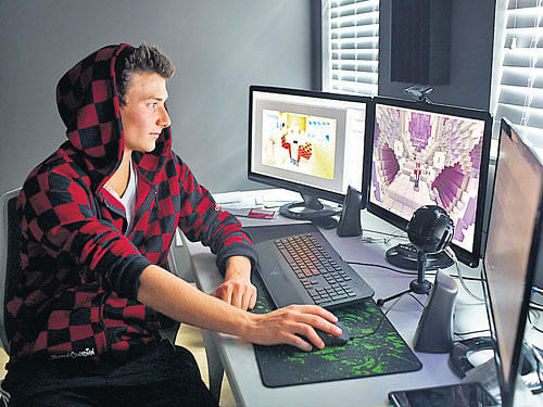 Mitchell Hughes, a top Minecraft YouTuber, plays Minecraft at his home in St. Petersburg, Florida, USA. INYT