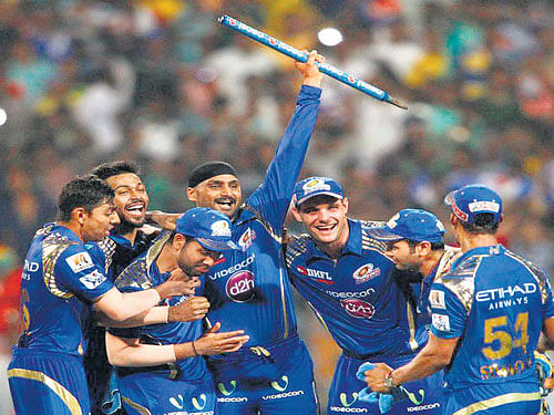 stunning turnaround: Mumbai Indians' players celebrate after defeating the Chennai Super Kings in the final at the Eden Gardens on Sunday. bcci