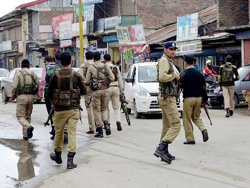 Special Operation Group (SOG) of Jammu and Kashmir Police personnel search for militants who attacked a BSNL telecome franchise at Sopore on May 25, 2015. PTI file  Photo