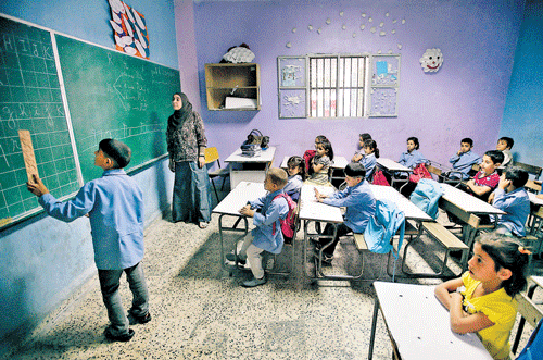 Closing the Gap: Students in a public school in Lebanon. The biggest obstacle to quality education is developing a useful measure of educational competence to ensure accountability around the world among radically different cultures with different educational philosophies. ap