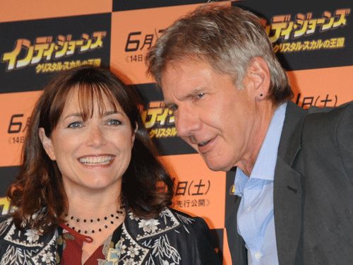 Hollywood star Harrison Ford, right, chats with his co-star Karen Allen. AP File Photo.