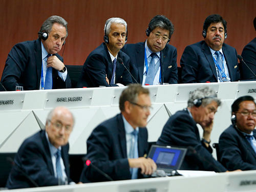 FIFA Executive Committee members Vitaly Mutko of Russia, Sunil Gulati of the U.S., Zilong Zhand of China and Luis Bedoya of Columbia listen to FIFA President Sepp Blatter at the 65th FIFA Congress in Zurich, Switzerland, May 29, 2015. Embattled FIFA president Sepp Blatter called on members of world soccer's governing body to stick together to stamp out corruption in the wake of the latest scandal to hit the game. REUTERS