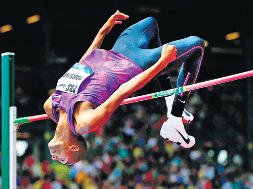 sky is the limit: Qatar's Mutaz Essa Barshim en route his win in the high jump competition on Saturday. reuters