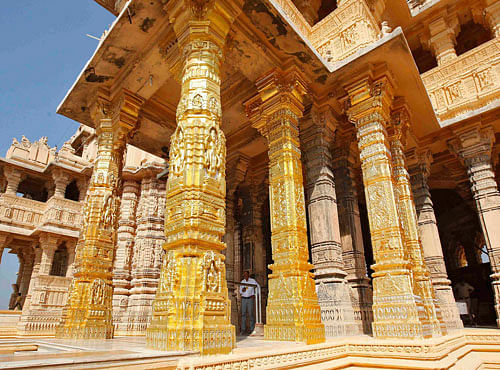 An Indian security personnel stands guard amidst the gold-plated pillars of the Hindu god Shiva temple at Somnath. Reuters file photo