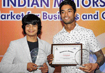 PROUD MOMENT: Young achievers Arjun Maini (left) and  CS Santosh were felicitated by CII on Friday. DH PHOTO