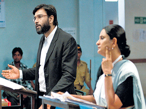 Real stories A still from the award-winning film 'Court'; filmmaker Chaitanya Tamhane.