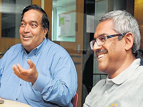 NASSCOM Product Council Chairman Ravi Gururaj (left) and AngelPrime Managing Partner Sanjay Swamy during the hackathon in Bengaluru on Saturday. DH PHOTO