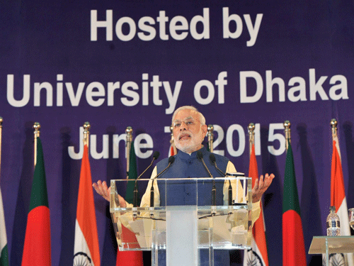 Prime Minister Narendra Modi addresses at the Bangabandhu International Convention Centre, in Dhaka, Bangladesh on Sunday. PTI Photo