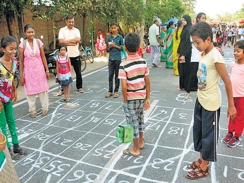 FUN TIME Children take part in the traditional games as part of