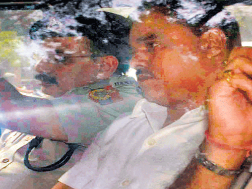 Delhi LawMinister Jitender Singh Tomar, after his arrest, in NewDelhi on Tuesday. PTI