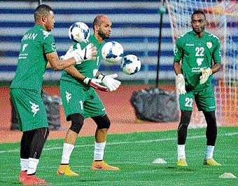 Omani goalkeepers go through a routine during a practice session. DH photo