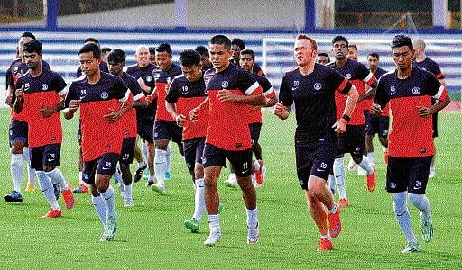 ALL SET: Indian players warm-up ahead of a training session on the eve of their World Cup qualifer against Oman. DH PHOTO/ SRIKANTA SHARMA R