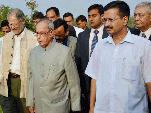 President Pranab Mukherjee with Delhi Lt Governor Najeeb Jung and Chief Minister Arvind Kejriwal at the inauguration of a sewage treatment plant at the President's Estate in New Delhi on Monday. PTI Photo