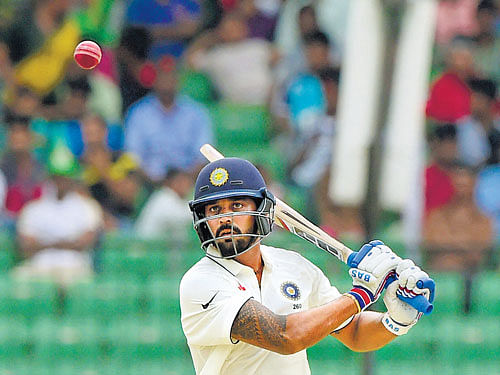 unwavering: India's M&#8200;Vijay essays a shot en route his 150 against Bangladesh at Fatullah on Friday. reuters