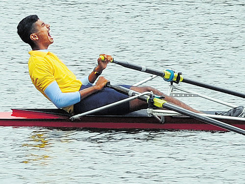 ecstatic: Karnataka's Ajith Kumar A celebrates after advancing to the men's Single Sculls  final in Bengaluru on Friday. dh photo