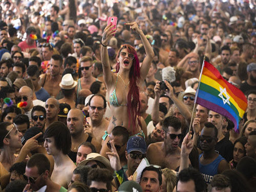 Revellers take part in a gay pride parade in Tel Aviv, Israel, reuters photo