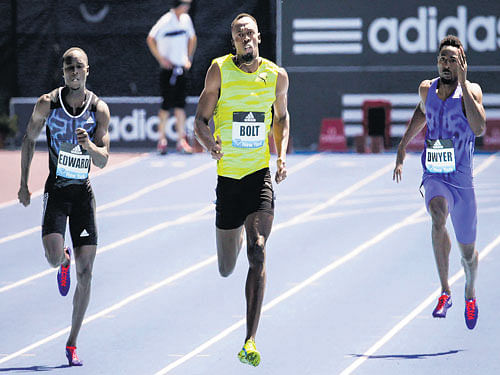 struggling: Usain Bolt (centre) en route to winning the 200M gold at the Adidas GP on Saturday. reuters