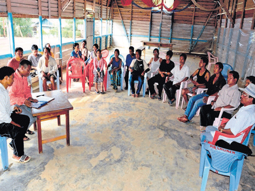 Some of the Paraolon villagers, who fled after the June 4 attack, organised a meeting to chalk out their paln on how they want to get back to their village in a community hall near Chandel town in Manipur.  DEEPAK OINAM