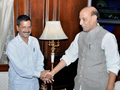 Chief Minister of Delhi, Arvind Kejriwal meets with Union Home Minister Rajnath Singh in New Delhi on Monday. PTI Photo