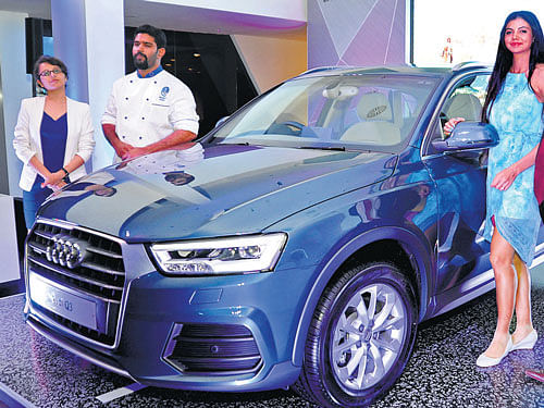 Golfer Sharmila Nicollet (right) unveils the new Audi Q3 at the Audi Bengaluru showroom in Electronic City, Bengaluru, on Friday. DH Photo by Kishor Kumar Bolar