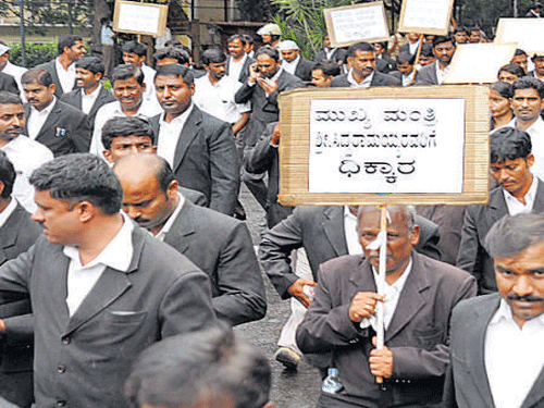 Advocates take out a protest rally in the City on Friday.   DH photo