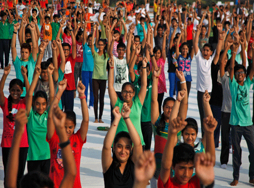 children attend yoga rehearsals ahead of International Yoga Day. AP photo
