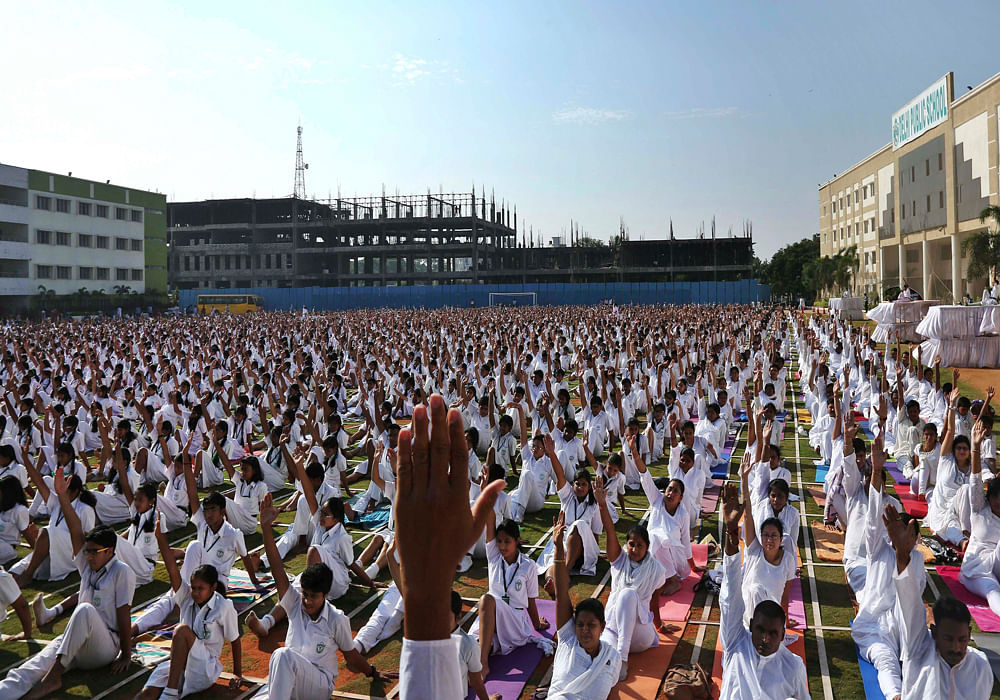 While the Department of Public Instruction (DPI) has not issued any circular asking schools under it to mandatorily participate in the Yoga Day, around 11,000 students from the primary and secondary level, as well as those from PU&#8200;colleges, will be taking part in the day's celebrations at Kanteerava stadium. AP file photo
