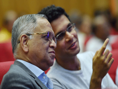 Infosys Co Founder Narayan Murthy with his son Rohan Murthy during the 34th Annual General Meeting of the company in Bengaluru on Monday. PTI photo