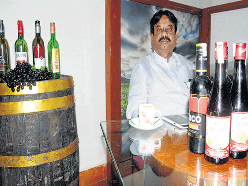 Karnataka Wine Board chairman Bakkappa Kote poses  during a press conference in Bengaluru on Monday. DH photo