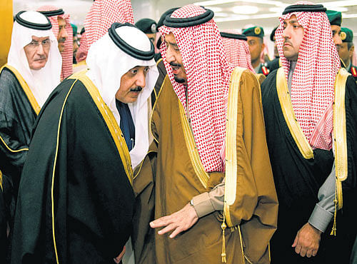 HUSHEDTONES: In this file photo, Saudi King Salman, centre, speaks to Crown PrinceMuqrin. WikiLeaks is in the process of publishing more than 5,00,000 Saudi diplomatic documents to the Internet. Saudi leaders, however, have not confirmed the leak's authenticity. AP