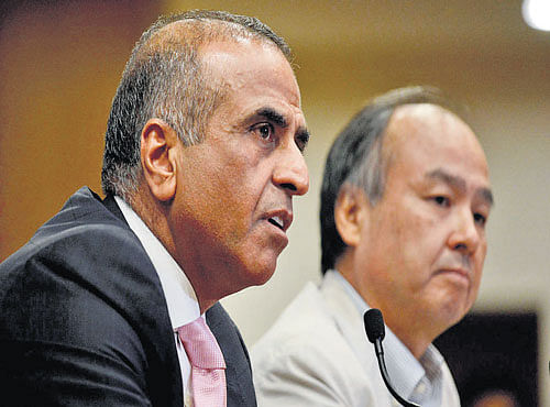 Bharti Enterprises Chairman Sunil Bharti Mittal (left) and SoftBank CEO Masayoshi Son in NewDelhi on Monday.