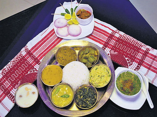 Sumptuous | A 'thali' comprising  'Joha' rice, two types of 'dals', mixed  vegetable, 'khar' and 'xaak'.