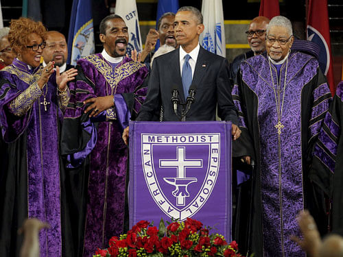 U.S. President Barack Obama leads mourners in singing the song 'Amazing Grace' as he delivers a eulogy in honor of the Reverend Clementa Pinckney during funeral services for Pinckney in Charleston. Reuters Photo