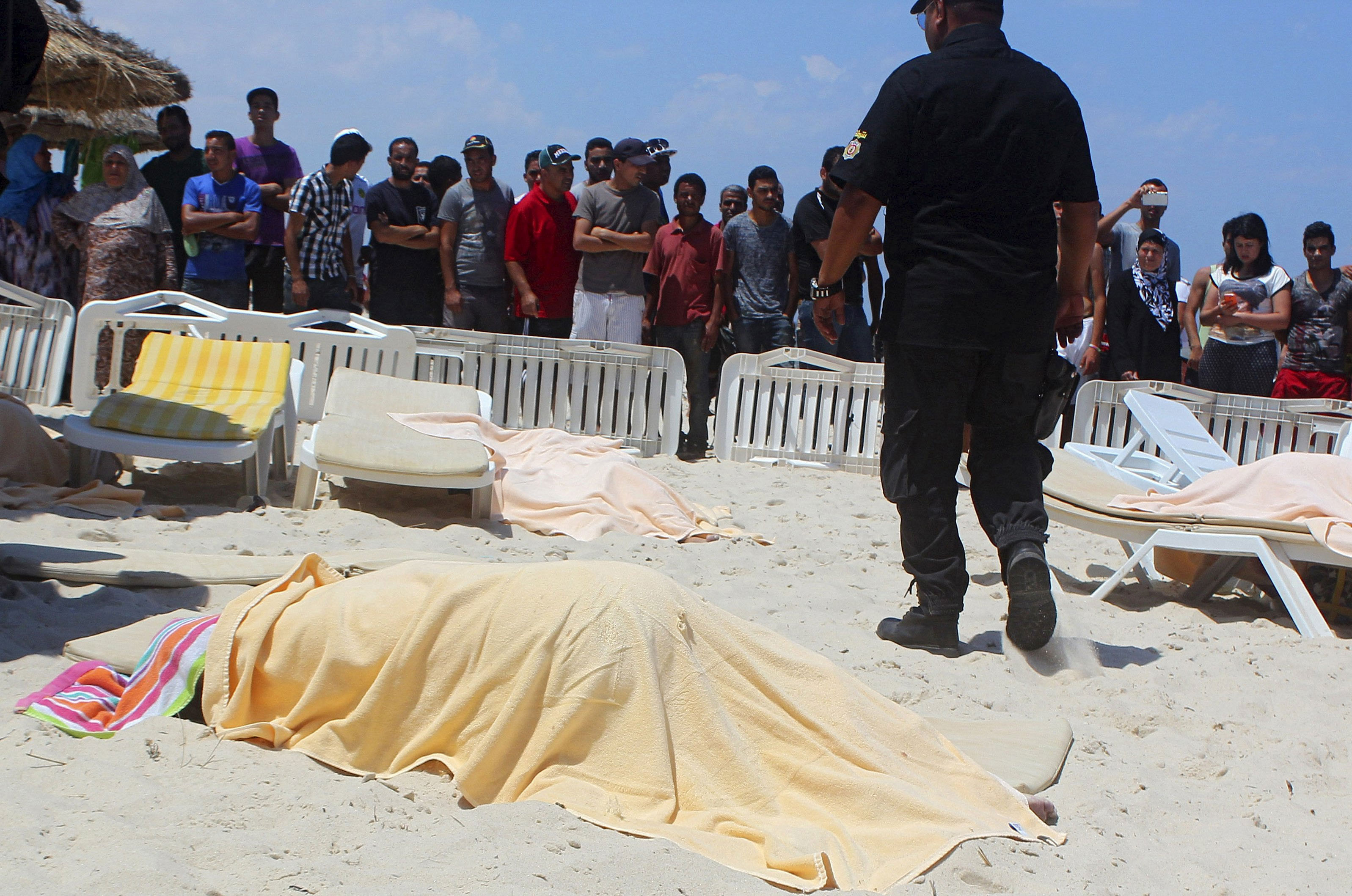 The body of a tourist shot dead by a gunman lies near a beachside hotel in Sousse, Tunisia. Reuters Photo
