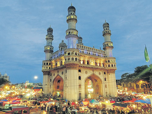 buzz in town (Clockwise from above) Stalls stationed around Charminar during Ramzan (Photo by author); 'shahi tukda', a bread pudding sold during the festival; display of bangles at Night Bazaar in Hyderabad.